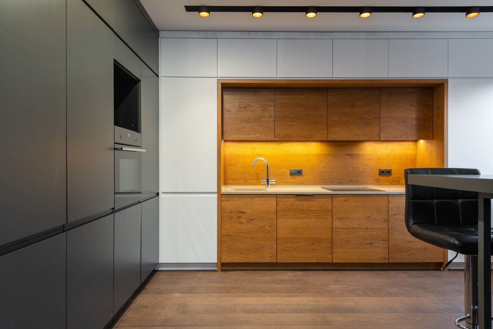 Built-in oven in a modern gray kitchen