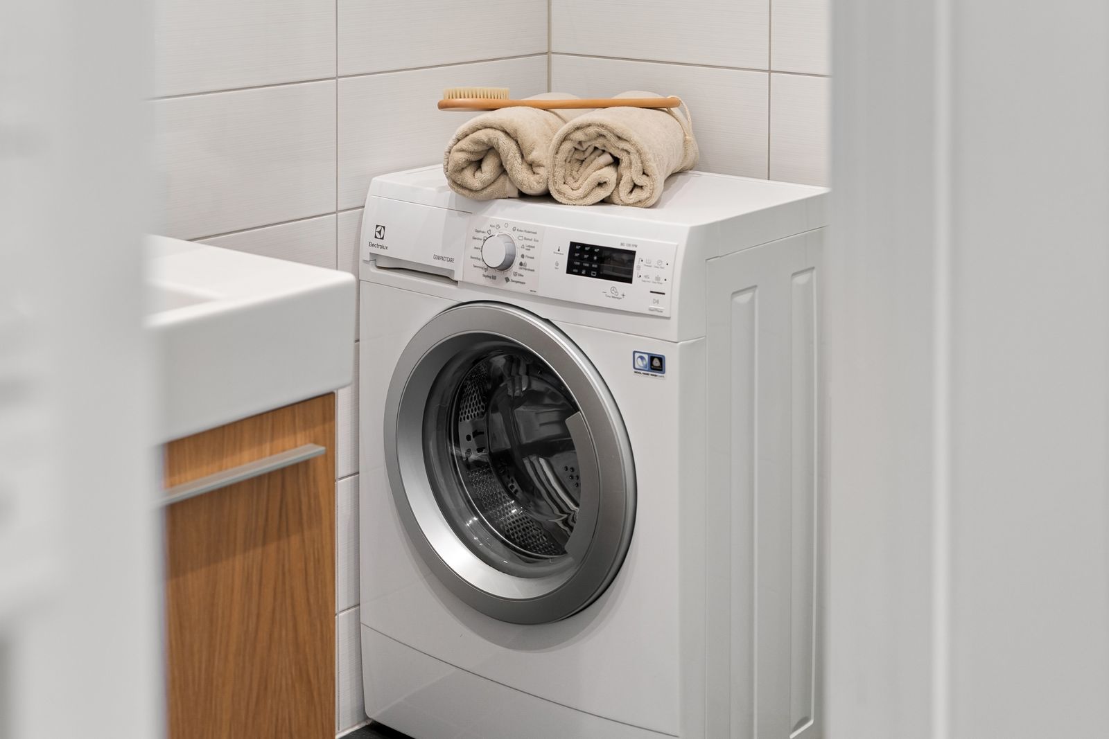 Front-load washing machine in a clean home laundry room